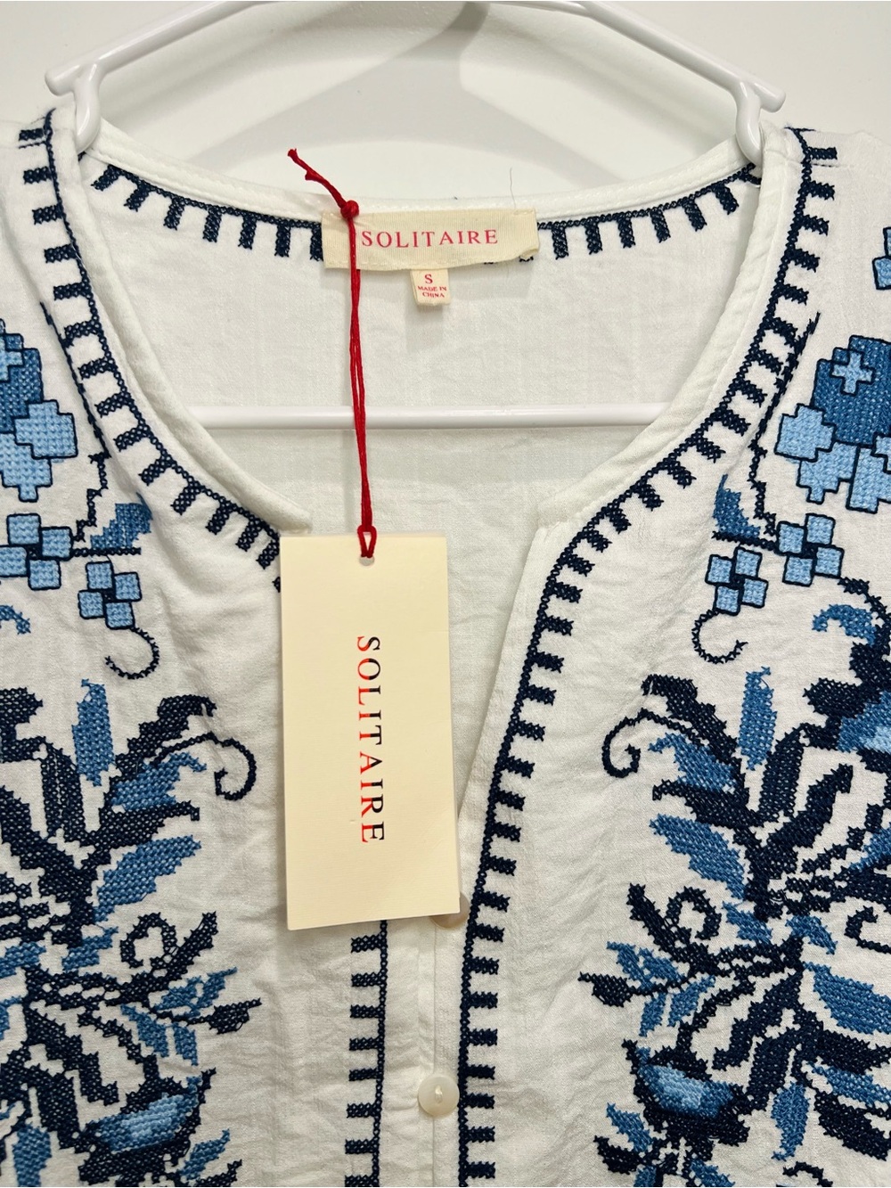 SOLITAIRE White Peplum Top with Blue Floral Embroidery - Picture 2 of 10